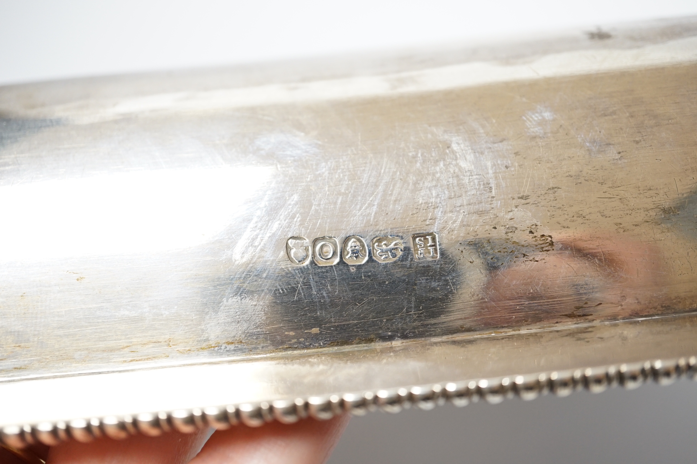 A matched silver entree dish and cover, base Foskett & Stewart, London, 1809, 31.2cm, cover makers mark rubbed, London, 1806, 64.4oz, with a silver plated handle